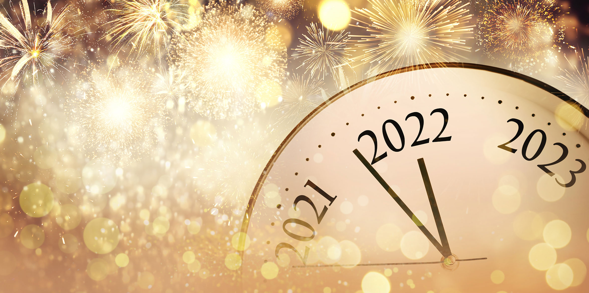 Clock counting last moments to New 2022 Year and beautiful fireworks on background, banner design